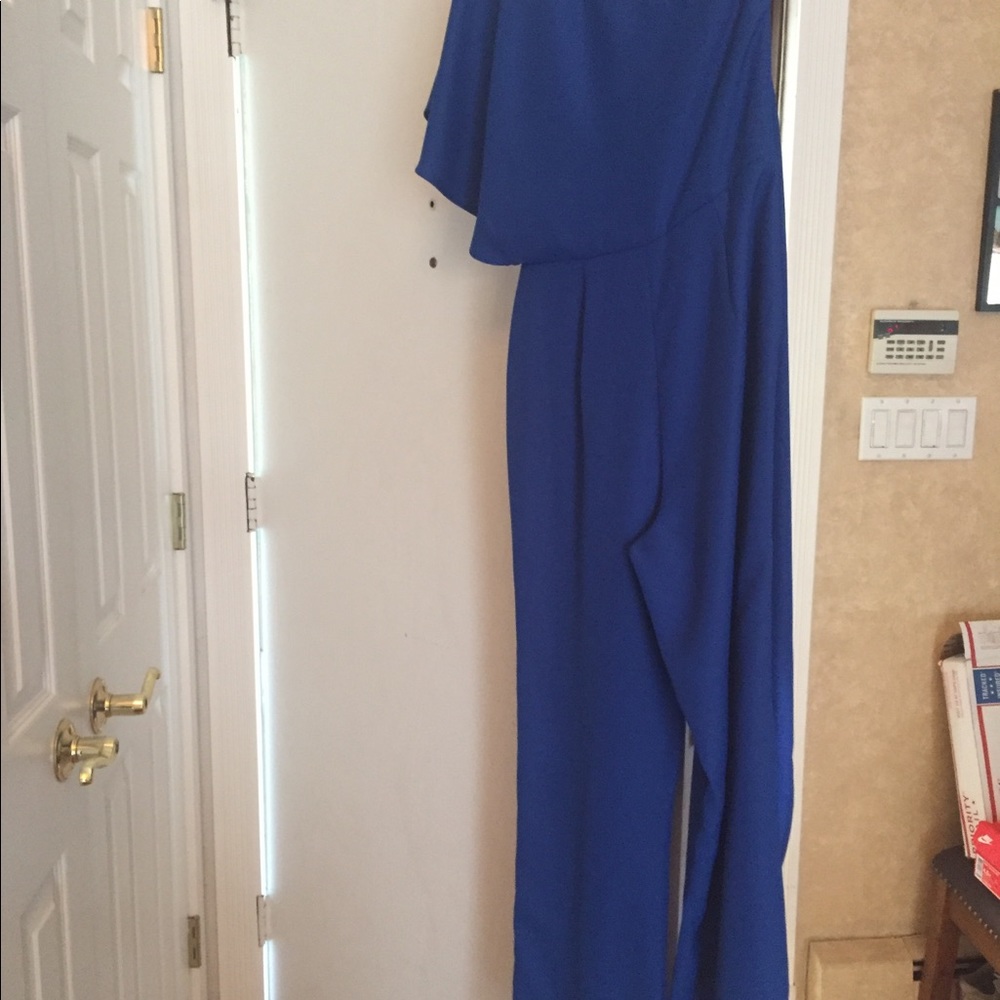 - Never worn Jumpsuit